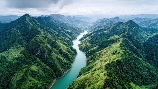 Serene river valley nestled within verdant mountain range