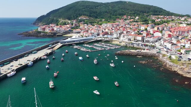 Aerial View of Fisterra Coastal Village and Harbor Adjacent to Langosteira Beach in Galicia, Spain