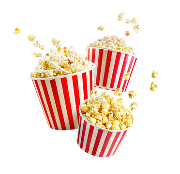 Popcorn bursts from striped paper containers