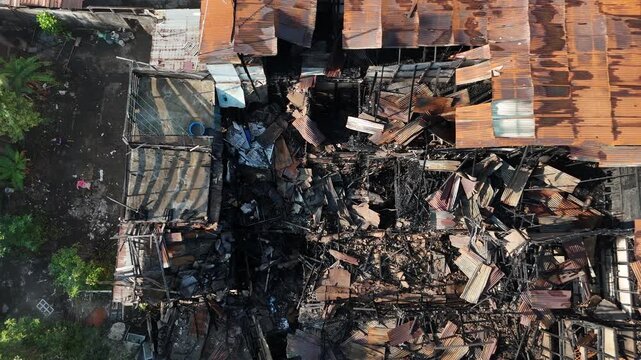 Aerial View of the Rooftops of Slum Settlements That Have Burned Down and the Charred Debris Left Behind After the Fire.