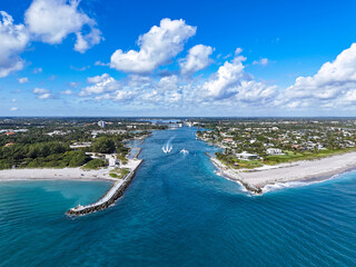 Boats leaving and returning from the Atlantic Ocean at Jupiter Inlet in Palm Beach County, Florida. © Ryan Tishken