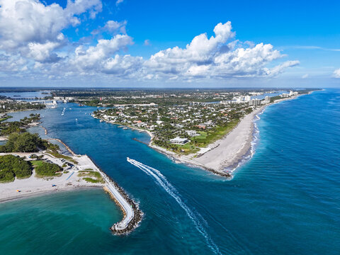 Boat headed back to port from the Atlantic Ocean at Jupiter Inlet in Palm Beach County, Florida.