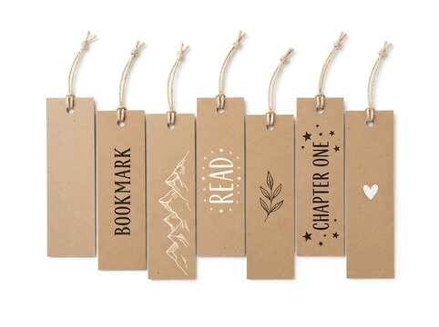 Seven rustic brown paper bookmarks with unique hand drawn illustrations and text on white background