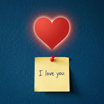 Glowing Red Heart Symbol Above Yellow Sticky Note Message "I Love You" Pinned to Blue Wall