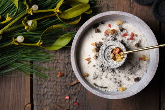 Close-up of a preparation for an incense ritual - placing incense with a spoon a glowing charcoal