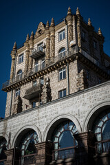 Fototapeta premium Gorodetsky House Detailed Facade with Decorative Elements and Arched Windows