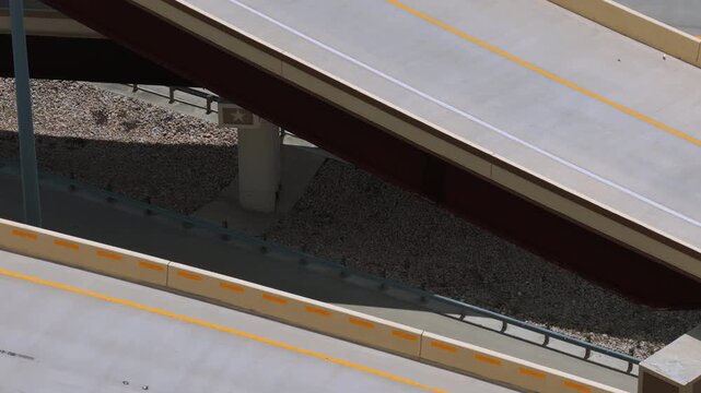 Telephoto Aerial Orbit of 290 183 Interchange Ramps in Manor Texas Part 5 of 12