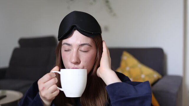 Coffee addiction morning routine woman smiles before first sip knowing only caffeine can lift her mood and help her finally feel awake after restless sleep