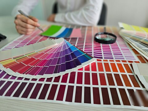 Choosing color samples for a design project in a modern office
