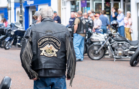 Alnwick, Northumberland, UK - June 20 2026. A member of the HOGs Geordie Chapter stands proudly in the club waistcoat at the annual charity ride in Alnwick.
