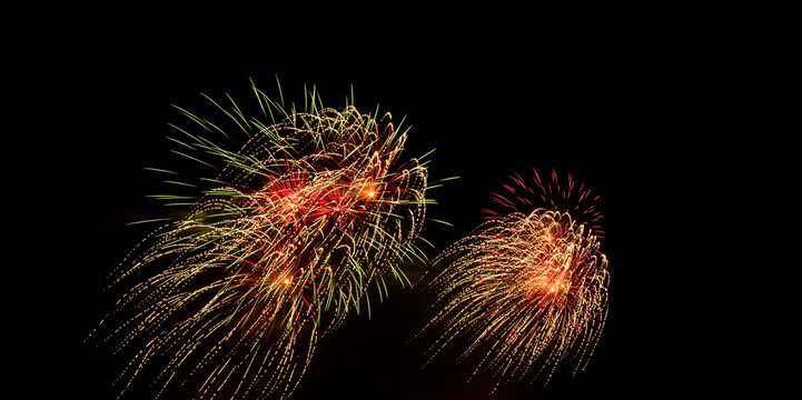 Set of colorful fireworks on black background.