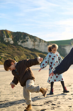 children playing on the beach