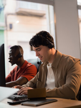Cheerful people working at customer service  team 