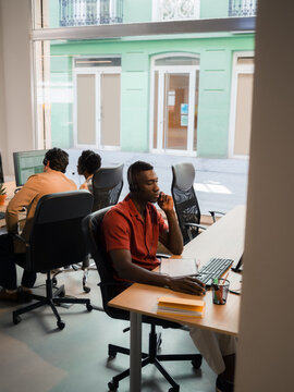 Call centre workers busy at office 