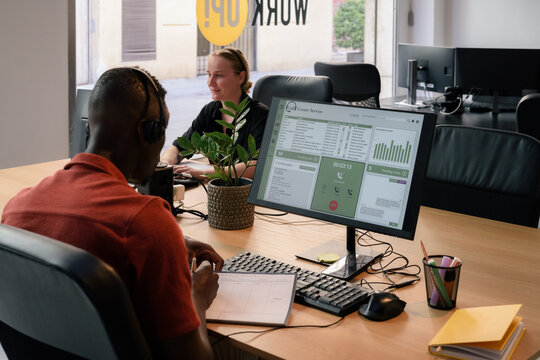 Call centre employees working at office 