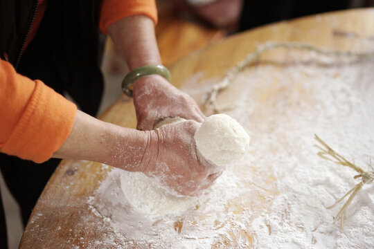 Closeup of glutinous rice balls being made