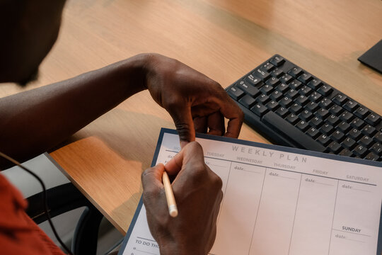Man planning his work at office 