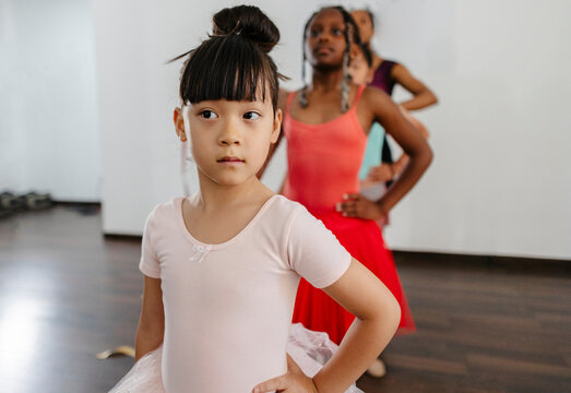 Girls practicing ballet in diverse dance class