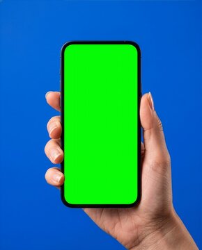 Hand Holding Smartphone with Green Screen Mockup Isolated on Clean Background for Mobile App Presentation