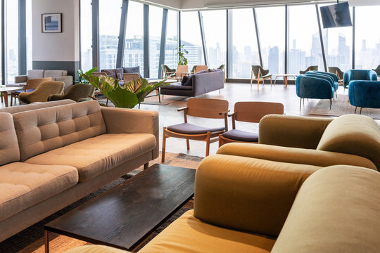 Comfortable Seating Area in Empty Modern City Office With Skyline View