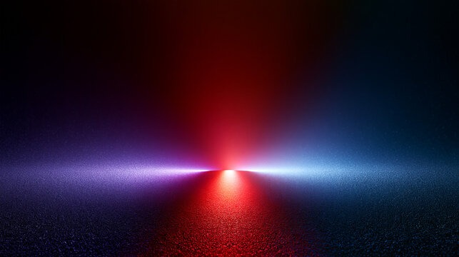 Rotes und blaues Lichtspektrum treffen sich auf dunklem Asphalt in gegens&auml;tzlicher Stimmung