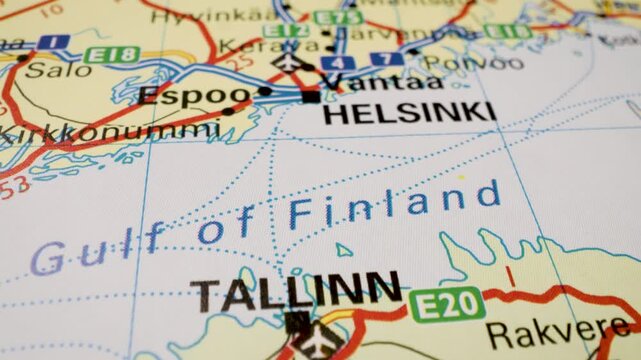 tallinn to helsinki sea route on geographical paper map with gliding camera view