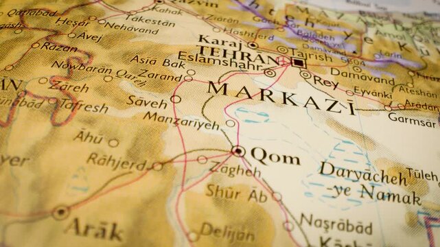 tehran, iran destination highlighted on paper map with gliding camera view