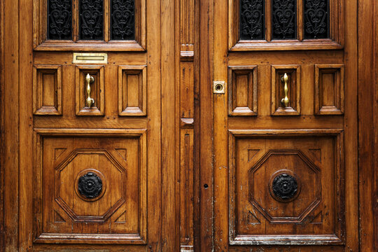 Wooden Doors Stand Closed in a Historic Building in the City of Paris