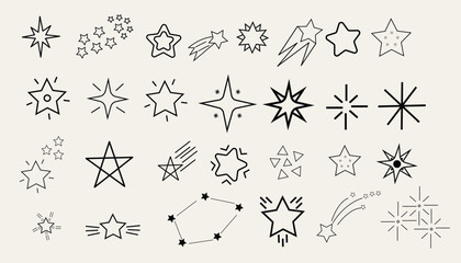Fototapeta premium Collection of hand drawn stars and sparkles on a white background decorative elements