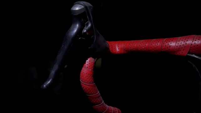 Isolated Close Up of Road Bike Handlebars with cinematic Dark Transition 4k video