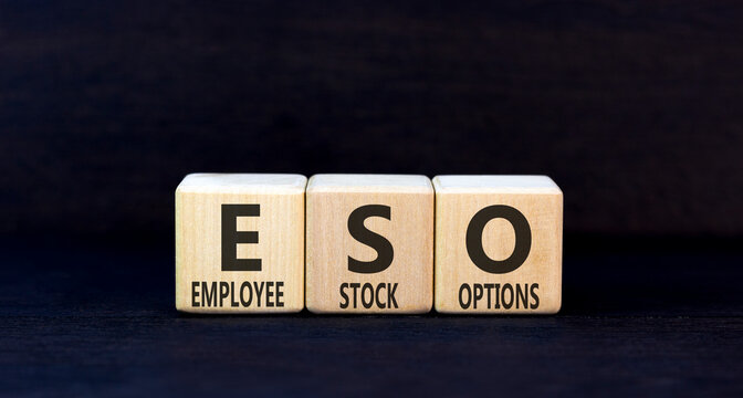 ESO employee stock options symbol. Concept words ESO employee stock options on beautiful wooden blocks. Beautiful black background. Business ESO employee stock options concept. Copy space.