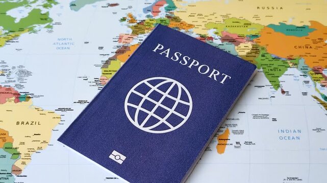 International passport against a map backdrop, representing the concepts of travel, hiking, and relocation. Passport on a map as a background for your design