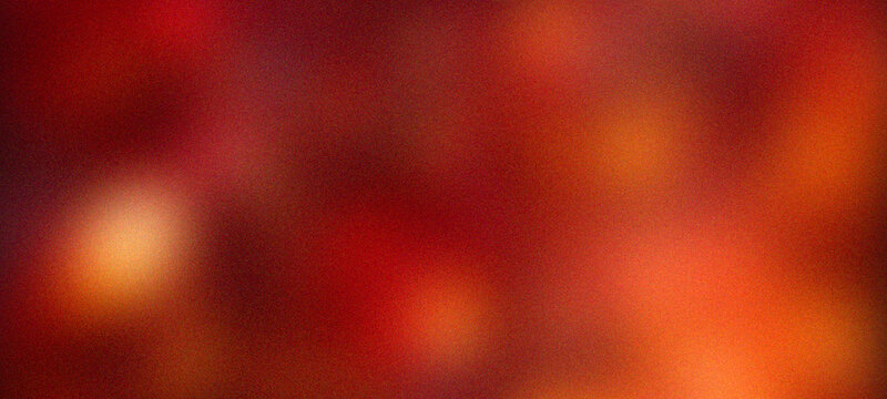 Abstract red background with grainy texture and soft blur gradient effect for artistic design projects or digital presentation screensaver display featuring warm vibrant hues in simple aesthetic style