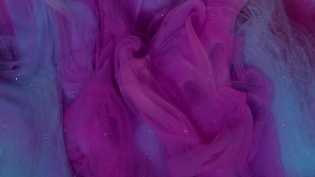 Paint vapor. Cloud blend. Blur blue pink purple color glitter texture broken glass swirl on abstract acrylic underwater abstraction.