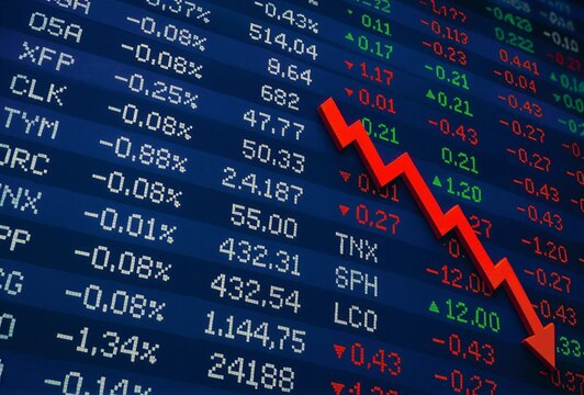 Red down arrow over a stock board with falling prices and market quotes, illustrating stock market crash and panic.
