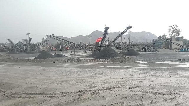 Stone Crusher Plant with Conveyor Belts Working at an Industrial Construction Site