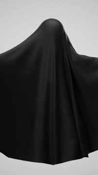 Ghost covered with a black sheet moving on a white background for a spooky Halloween scene animated Vertical video.