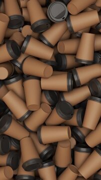 Camera pan over a pile of disposable cups in black for cafe packaging and takeaway beverage concept. Vertical video.