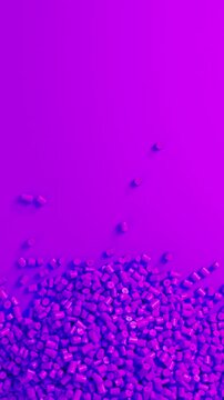 Close-up top view of rotating violet polypropylene plastic granules and masterbatch resin pellet pile, 3D render seamless Vertical video.