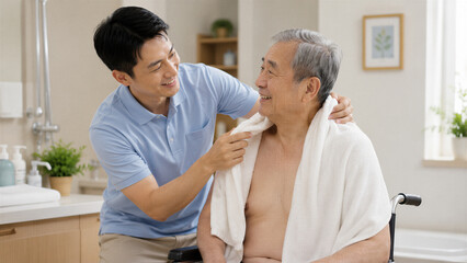 Fototapeta premium Family member drying elderly man with towel in bathroom caregiving