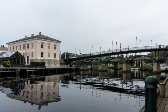 Halden Tista river bridge with building reflections