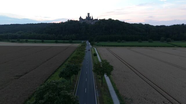 Country road leading toward Marienburg Castle near Hannover Germany
