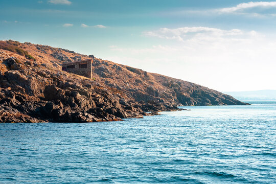 sea coast of bulgaria. travel background for summer vacations in europe. rock shore of st. peter island in evening light