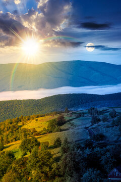 foggy carpathian mountain landscape. day meet night. outdoor adventure with stunning view. sun and moon in harmony over mountainous countryside of ukraine on summer solstice. rolling hills