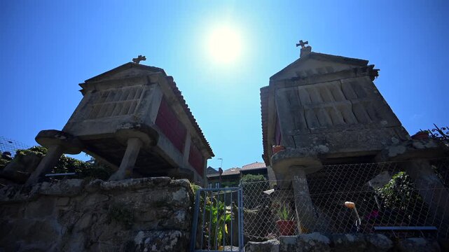 Traditional Granite H&oacute;rreos and Coastal Architecture along the Narrow Streets of Combarro in Poio, Galicia, Spain