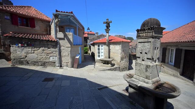 Traditional Granite H&oacute;rreos and Coastal Architecture along the Narrow Streets of Combarro in Poio, Galicia, Spain