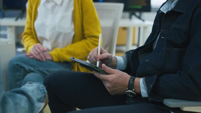 Diverse business team stacking hands for financial marketing campaign success data software code analysis digital technology hybrid workspace teamwork strategy startup office	