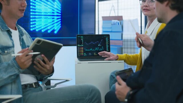 Diverse business team stacking hands for financial marketing campaign success data software code analysis digital technology hybrid workspace teamwork strategy startup office	