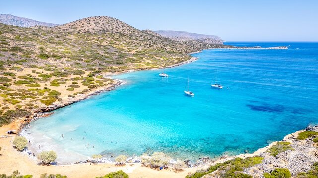Kolokithia Beach near Elounda in Crete is a hidden paradise with crystal-clear turquoise waters, rocky coves, and peaceful Mediterranean scenery, perfect for a relaxing escape.