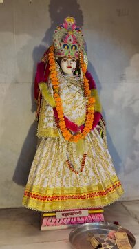 Goddess Brahmacharini beautifully adorned with floral garlands and traditional attire inside a temple. Worshipped as the second form of Navadurga, she represents devotion, penance, wisdom